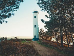 Preview wallpaper lighthouse, building, trees, hill, nature