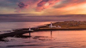 Preview wallpaper lighthouse, buildings, island, sea, evening