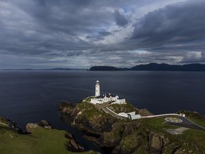 Preview wallpaper lighthouse, buildings, sea, coast