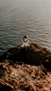 Preview wallpaper lighthouse, cliff, sea, aerial view, building