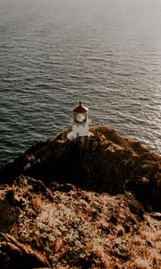 Preview wallpaper lighthouse, cliff, sea, aerial view, building