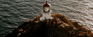 Preview wallpaper lighthouse, cliff, sea, aerial view, building