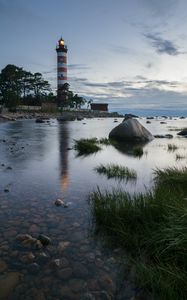 Preview wallpaper lighthouse, coast, building, sea, evening