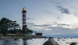Preview wallpaper lighthouse, coast, building, sea, evening