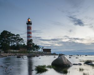Preview wallpaper lighthouse, coast, building, sea, evening