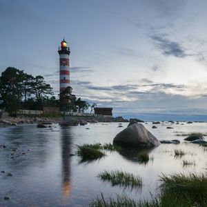 Preview wallpaper lighthouse, coast, building, sea, evening