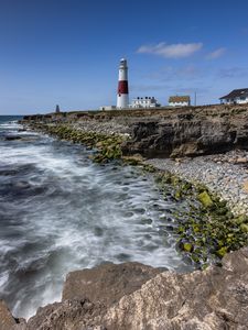 Preview wallpaper lighthouse, coast, foam, rocks