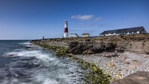 Preview wallpaper lighthouse, coast, foam, rocks