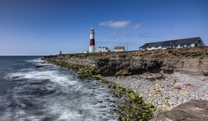 Preview wallpaper lighthouse, coast, foam, rocks