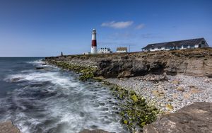 Preview wallpaper lighthouse, coast, foam, rocks