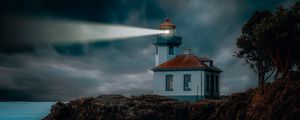 Preview wallpaper lighthouse, coast, glow, rocks, night