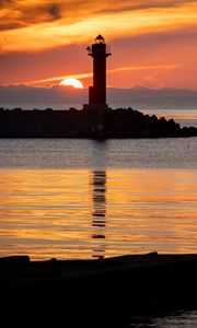 Preview wallpaper lighthouse, coast, island, sea, sunset, dark