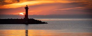 Preview wallpaper lighthouse, coast, island, sea, sunset, dark