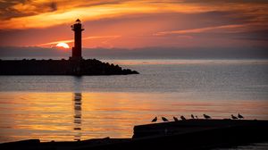 Preview wallpaper lighthouse, coast, island, sea, sunset, dark