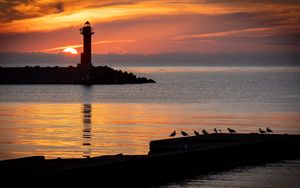 Preview wallpaper lighthouse, coast, island, sea, sunset, dark