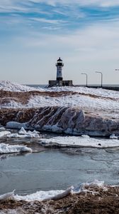 Preview wallpaper lighthouse, coast, river, ice, snow