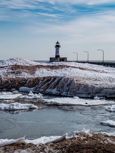 Preview wallpaper lighthouse, coast, river, ice, snow