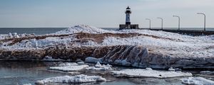 Preview wallpaper lighthouse, coast, river, ice, snow