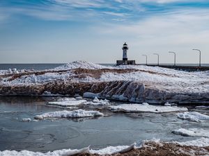 Preview wallpaper lighthouse, coast, river, ice, snow