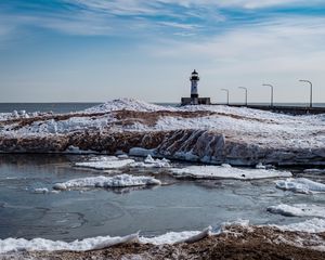 Preview wallpaper lighthouse, coast, river, ice, snow