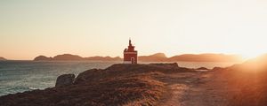 Preview wallpaper lighthouse, coast, rocks, road, nature
