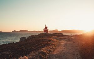 Preview wallpaper lighthouse, coast, rocks, road, nature