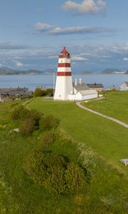 Preview wallpaper lighthouse, field, grass, sea, sky
