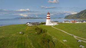 Preview wallpaper lighthouse, field, grass, sea, sky