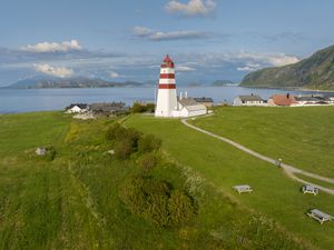 Preview wallpaper lighthouse, field, grass, sea, sky