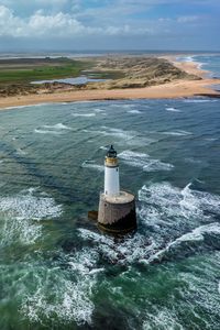 Preview wallpaper lighthouse, foam, coast, nature