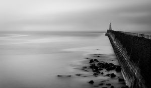 Preview wallpaper lighthouse, gloomy, stones, bw