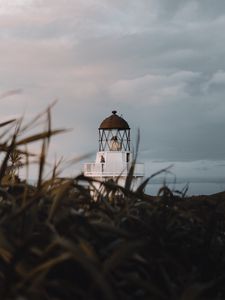Preview wallpaper lighthouse, grasses, building, coast
