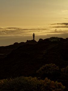 Preview wallpaper lighthouse, hills, silhouettes, evening