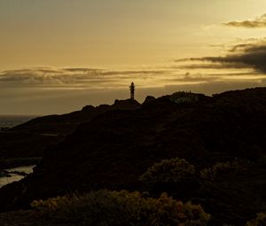 Preview wallpaper lighthouse, hills, silhouettes, evening