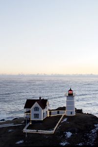 Preview wallpaper lighthouse, house, cliff, sea, nature