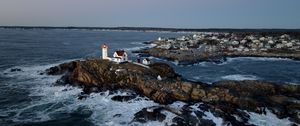Preview wallpaper lighthouse, house, rocks, sea