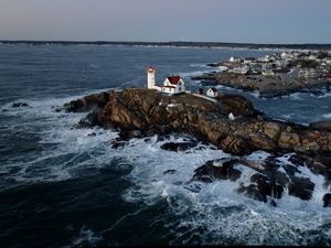 Preview wallpaper lighthouse, house, rocks, sea