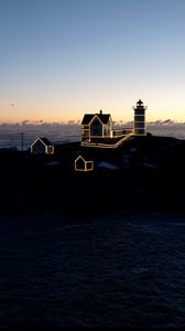 Preview wallpaper lighthouse, houses, neon, island, sea, twilight