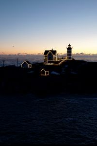 Preview wallpaper lighthouse, houses, neon, island, sea, twilight