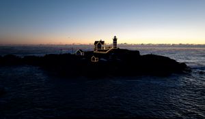 Preview wallpaper lighthouse, houses, neon, island, sea, twilight