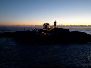 Preview wallpaper lighthouse, houses, neon, island, sea, twilight