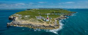 Preview wallpaper lighthouse, island, buildings, sea