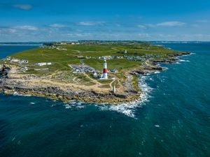 Preview wallpaper lighthouse, island, buildings, sea