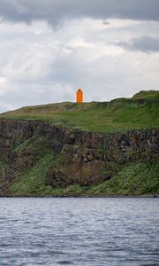 Preview wallpaper lighthouse, island, sea, cliff, grass