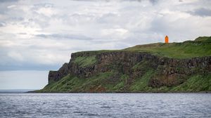 Preview wallpaper lighthouse, island, sea, cliff, grass