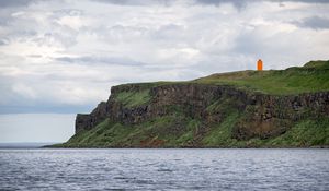 Preview wallpaper lighthouse, island, sea, cliff, grass