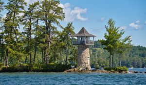 Preview wallpaper lighthouse, island, sea, trees