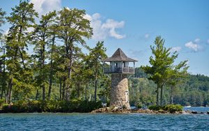Preview wallpaper lighthouse, island, sea, trees