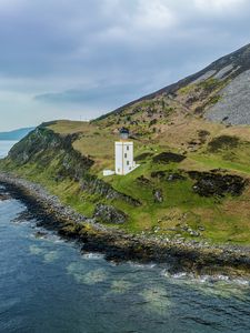 Preview wallpaper lighthouse, island, sea, nature, relief