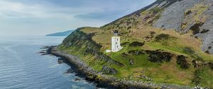 Preview wallpaper lighthouse, island, sea, nature, relief